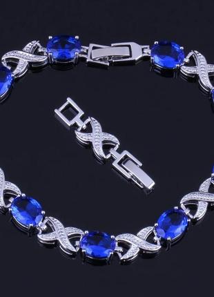 Браслет с с синіми цирконами 925знак нескінченності.