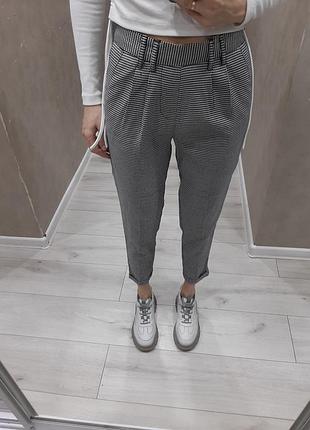 Брюки в клетку