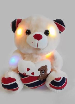 Світиться, говорить плюшевий ведмедик із серцем