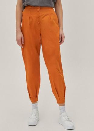 Оранжевые хлопковые брюки4 фото