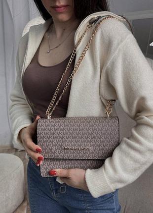 Жіноча сумка michael kors mini bag light beige бежева подарунок на 8 березня9 фото