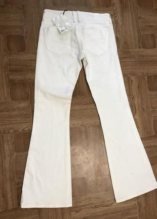Белые расклешенные джинсы на низкой посадке topshop6 фото
