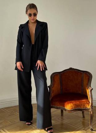 Костюм жіночий чорний однотонний оверсайз піджак з плечиками на гудзику оверсайз штани палаццо на високій посадці вільного крою