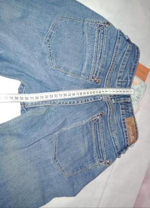 Женские джинсы клешом не сильно широкие фирменные5 фото
