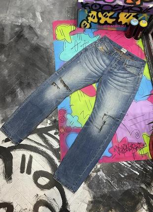 Щільні джинси  з фабричним потертостями і дірками loose
