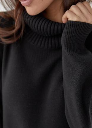 Женский черный вязанный костюм с широкими штанами и свитером гольфом водолазкой4 фото