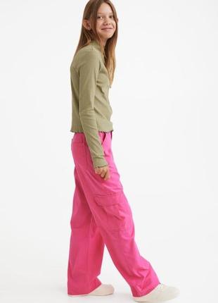 Брюки з карманами