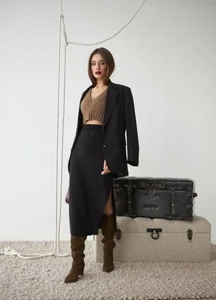 Вязаная юбка с ассиметричным разрезом черного цвета trikobakh 24355 фото
