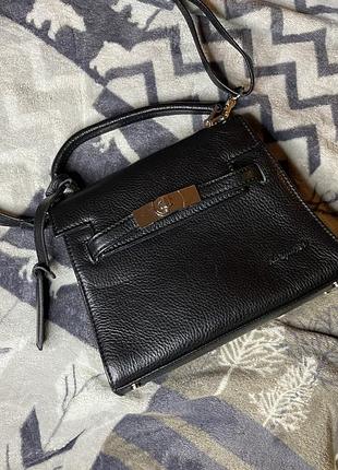 Кожаная сумка с ручкой