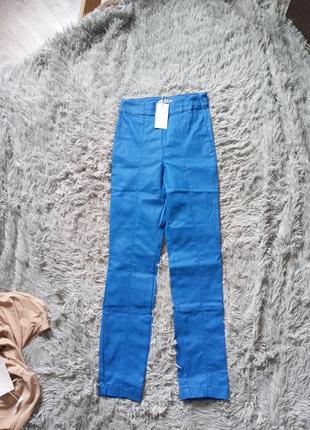 Кожаные брюки с восковым напылением1 фото