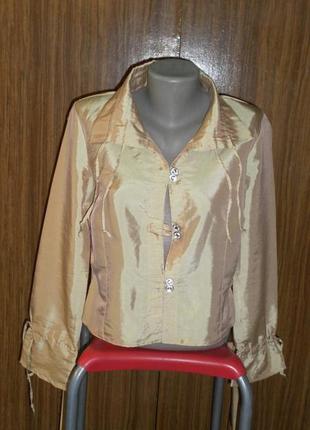 Золотистая атласная блуза, на пуговицах в виде кристаллов1 фото