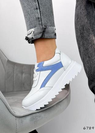 Натуральні шкіряні білі кросівки з блакитними вставками4 фото