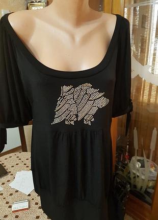 Туніка, кофта,блузон у великому розмірі,дуже круто виглядає.