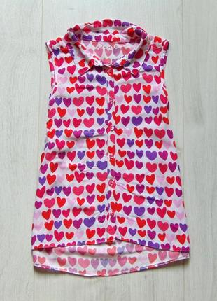 Яркая блуза для девочки.
nutmeg.
размер 8-9 лет