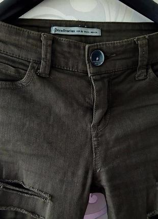 Зелені оливкові завужені вузькі рвані джинси хакі stradivarius скінні skinny5 фото
