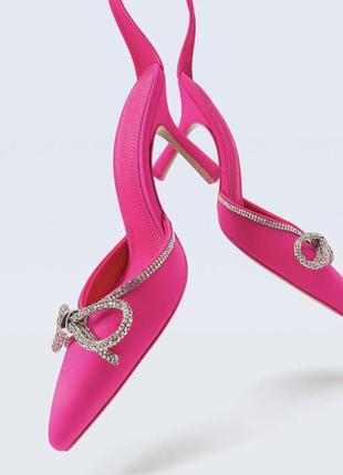 Рожеві туфлі з бантом