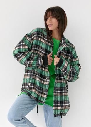 Жіноча демісезонна куртка у клітинку  колір:зелений1 фото