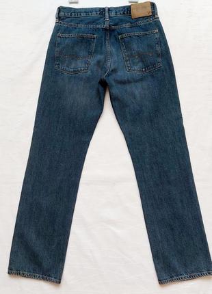 Красивые качественные джинсы,темно- синие,5 фото