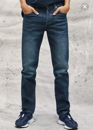 Красивые качественные джинсы,темно- синие,1 фото