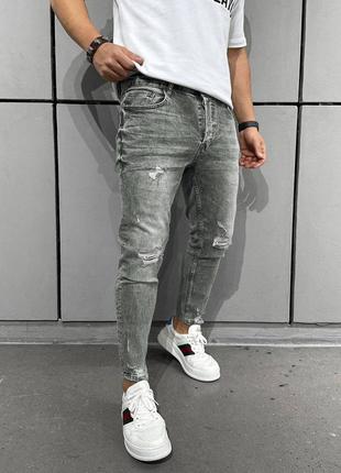 Зауженные джинсы премиум качества с потертостями рваные стильные2 фото