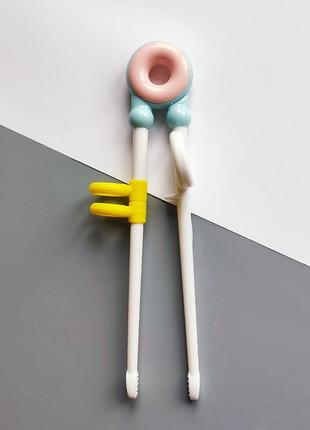 Дитячі навчальні палички для їжі пончик1 фото