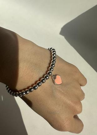 Браслет с розовым сердцем
