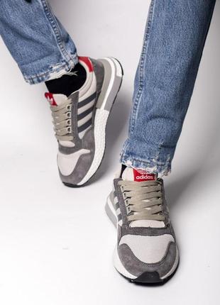 Удобные и красивые кроссовки adidas в сером цвете3 фото
