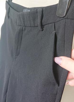 Фирменные чёрные женские брюки4 фото