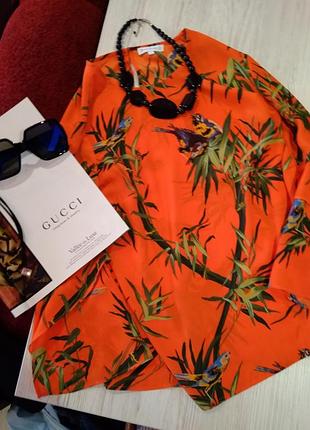 Стильная блузка с красивым рисунком, оригинальный рукав, без дефектов.