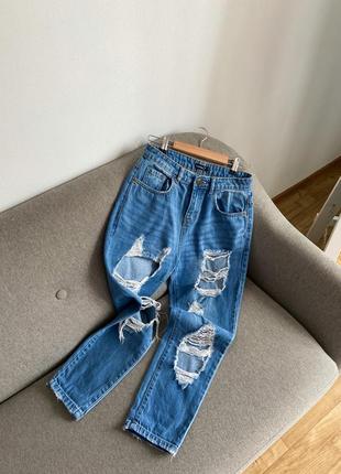 Блакитні джинси із рваностями2 фото