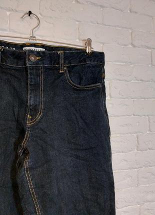 Фирменные стрейчевые джинсы 32р.2 фото