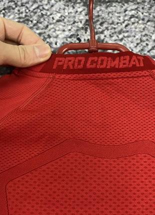 Женский крутой оригинальный термо лонгслив nike pro combat размер l4 фото