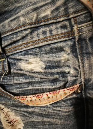 Крутые джинсы eight sin рваные с дырками вышивкой камнями потертостями5 фото