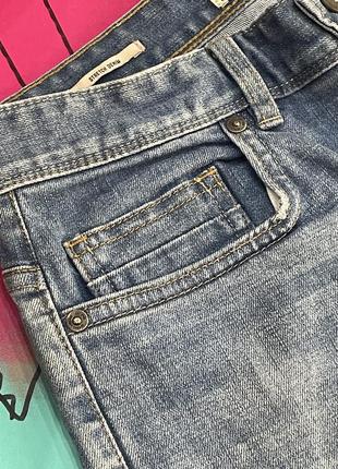 Зауженные плотные стрейч джинсы с фабричными потертостями slim next8 фото
