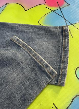 Зауженные плотные стрейч джинсы с фабричными потертостями slim next9 фото