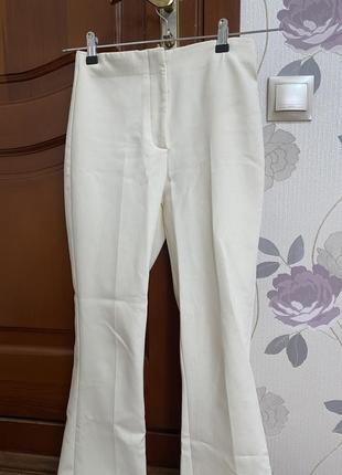 Продам білі брюки zara в ідеальному стані1 фото
