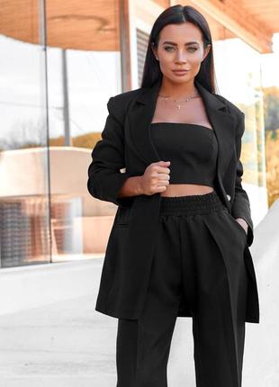 Костюм-трійка жіночий брючний, топ, піджак, штани прямого вільного крою, однотонний чорний3 фото