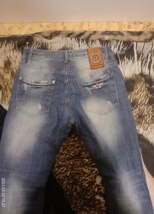 Рваные джинсы philipp plein2 фото
