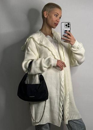 Жіночий кардиган коса з капюшоном.