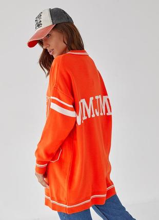 Женский удлиненный оранжевый пуловер свитер оверсайз с принтом2 фото