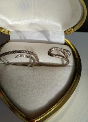 Серебряное двойное кольцо змея с полями стразами7 фото