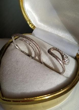 Серебряное двойное кольцо змея с полями стразами2 фото