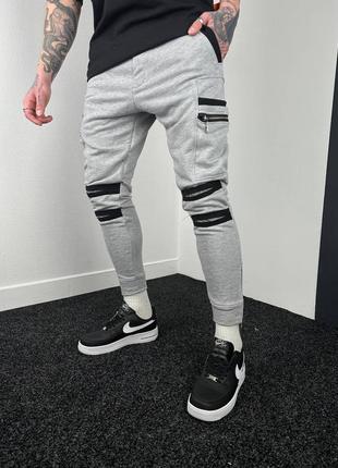Стильові спортивні штани із замками якісні завужені оригінальні
