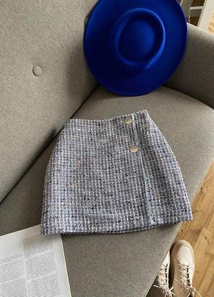 Блакитна твідова спідниця міні