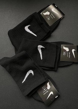 Шкарпетки чорні nike fitdry (висока посадка)2 фото