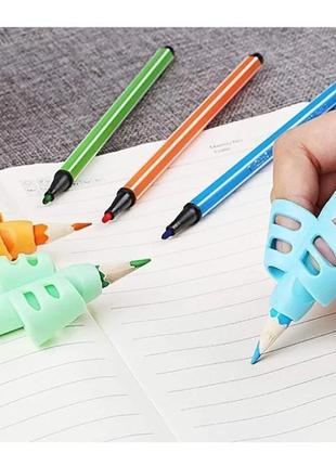Тренажер-тримач для ручок та олівців насадка для правильного письма