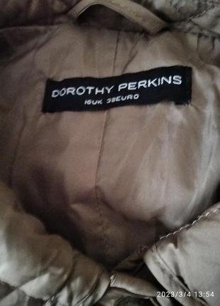 Легкая стеганая курточка7 фото