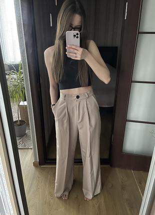 Брюки-палаци