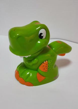 Музыкальный фонарик динозавр fisher-price