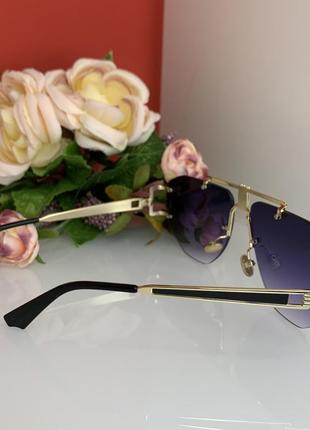 Солнцезащитные очки селин  женские брендовые коричневые 20214 фото